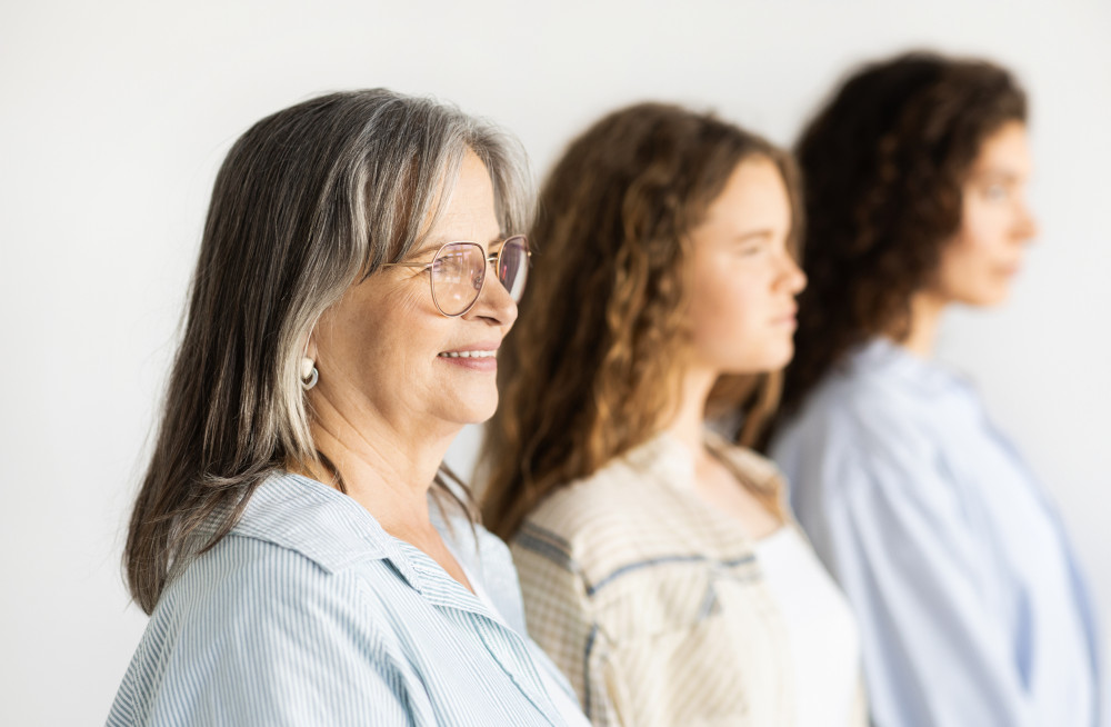 Cheerful pretty caucasian teen, millennial and old women
